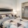 well lit bedroom with two closets