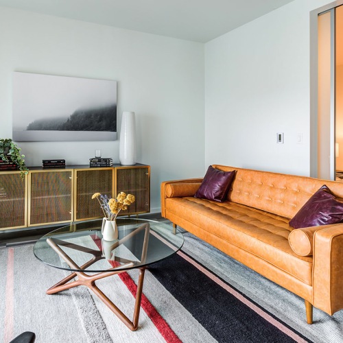 roomy living area with bedroom and kitchen access