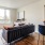 roomy living area with bedroom and kitchen access