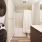 stackable washer/dryer units in well lit bathroom